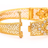 "The Golden Harvest: The Uncut Diamond Floral Bangle in 22Kt Yellow Gold" zaveribros.com